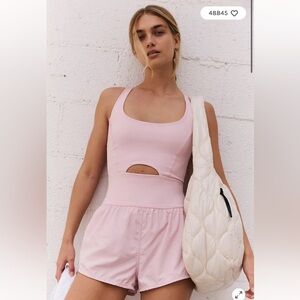 NWT FP Movement by Free People hotshot runsie Rose Water Light Pink Size Large